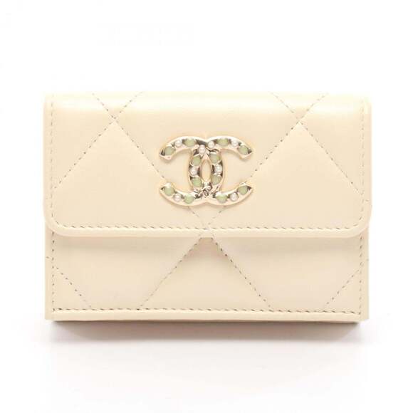 CHANEL Handbags - CHANEL White Leather Wallet